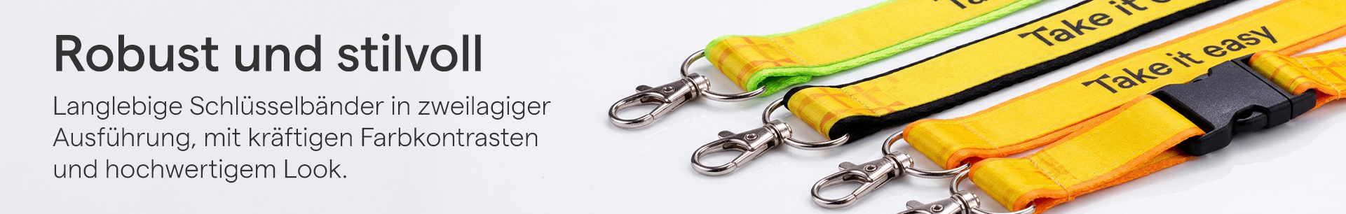 Zweilagiges Schlüsselband mit aufgenähtem Band und individuellem Logo-Druck für Firmen und Messen[cite: 11, 12].